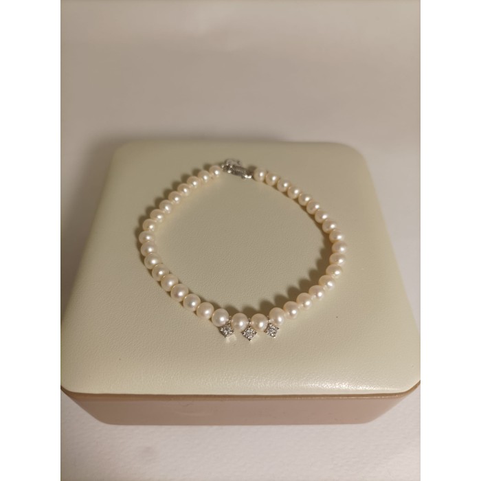 Acquista Bracciale COMETE GIOIELLI in oro bianco 18Kt perle e diama...